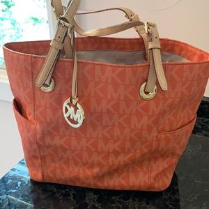 Michael Kors satchel orange large great condition leather straps